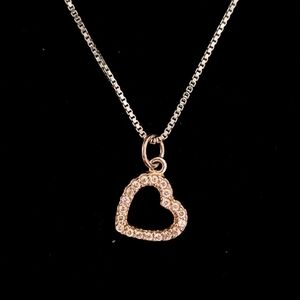 Sterling Silver Dangling Heart Necklace